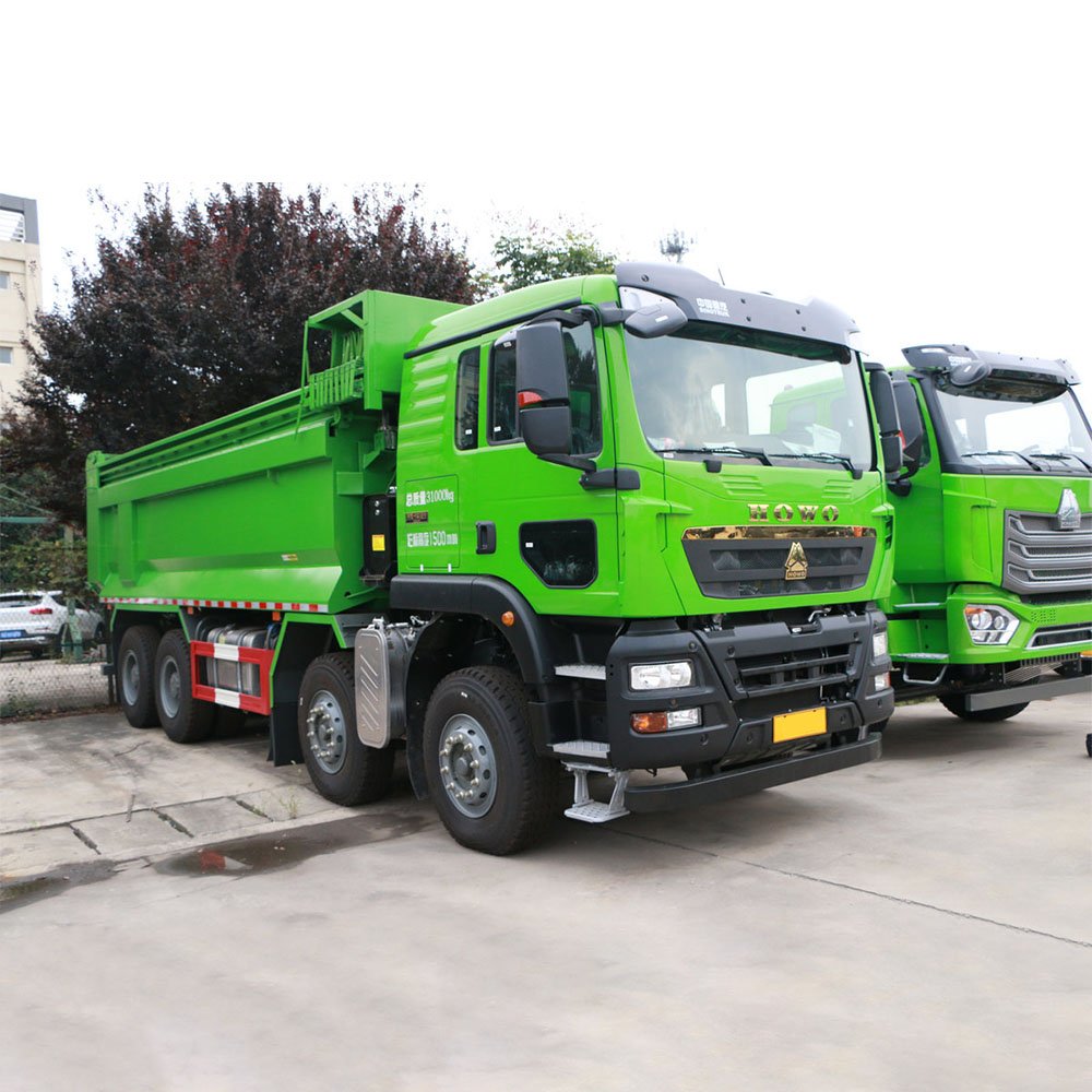 HOWO TX 8X4 dump truck 430 horsepower with 6.5m cargo body in construction site environment
