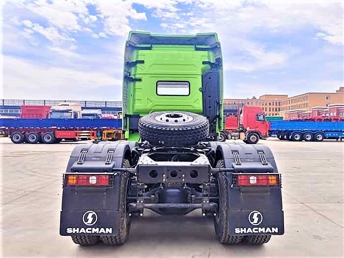 Rear view of Shacman X3000 showing double axles and fifth wheel