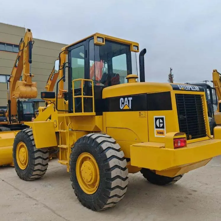 Used CAT 938 Wheel Loader front-side view with bucket and cab visible