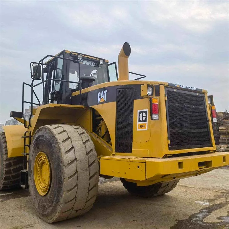 Close-up view of Used CAT 980 Wheel Loader front and cabin showing robust construction