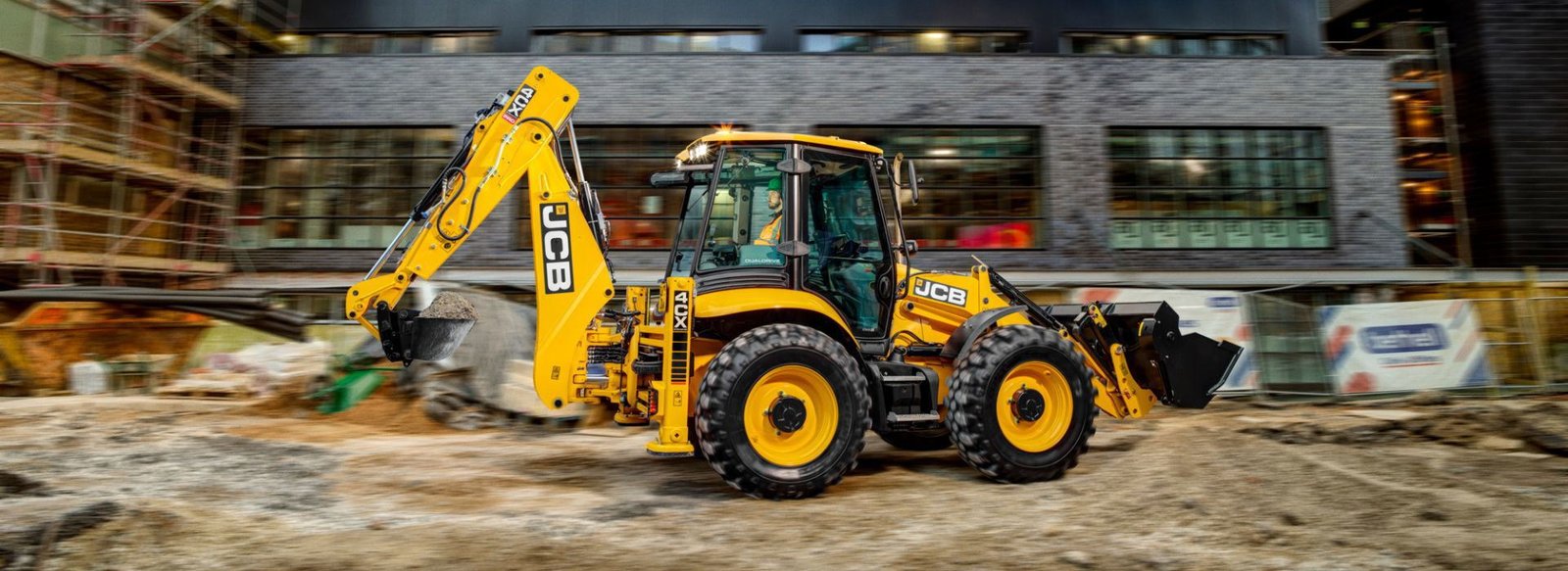 Used JCB backhoe loader lineup with 3CX and 4CX models for construction and utility work