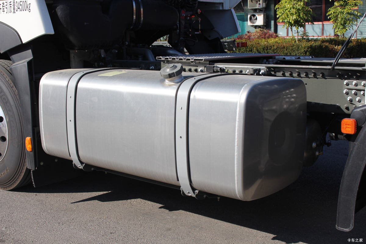 Fuel tank detail of Sinotruk tractor showing lightweight alloy construction
