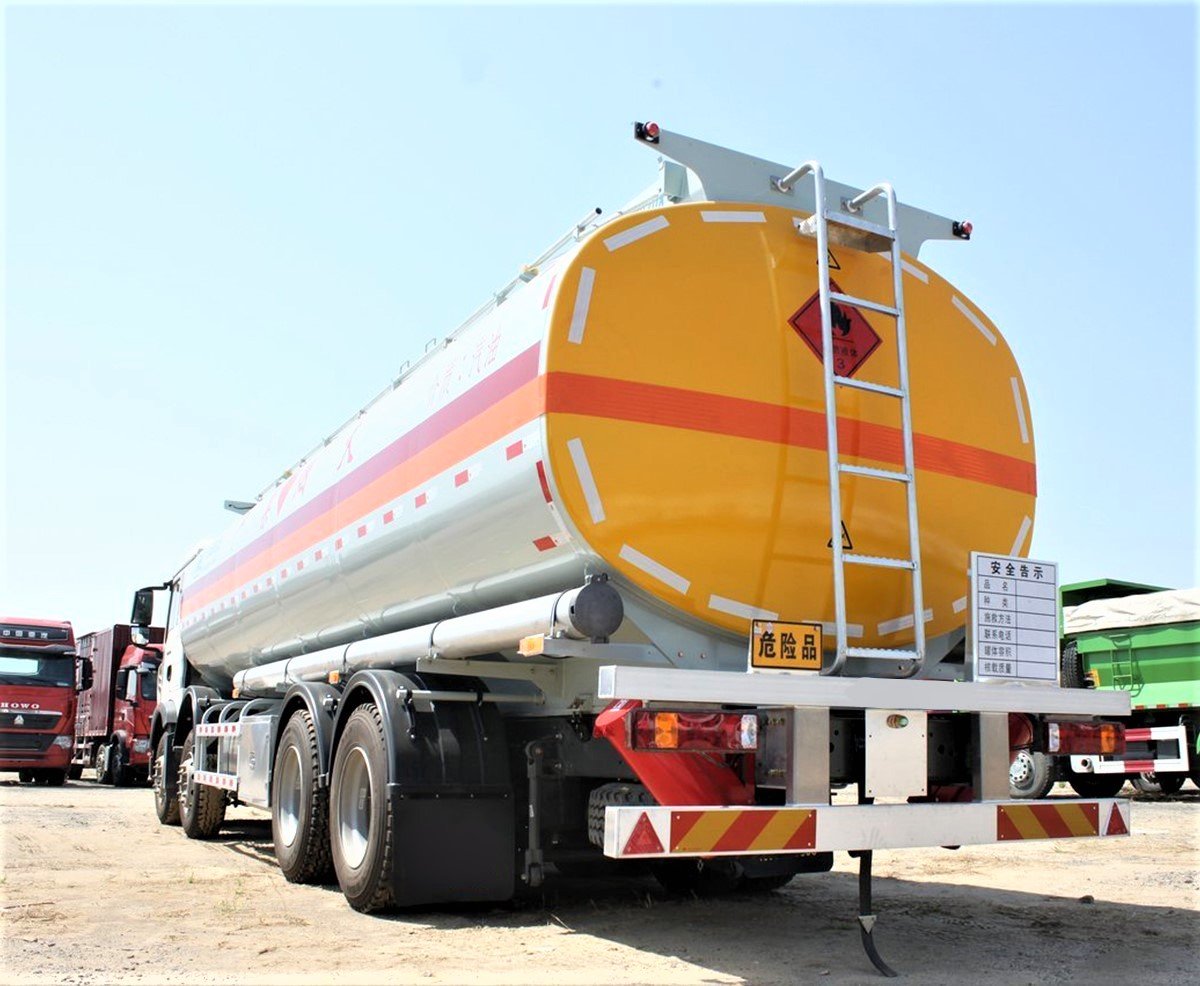 HOWO 8×4 fuel tank truck side profile with 340HP engine for bulk fuel transport