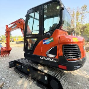 Doosan DX60 compact excavator front view showing robust design and operator cab