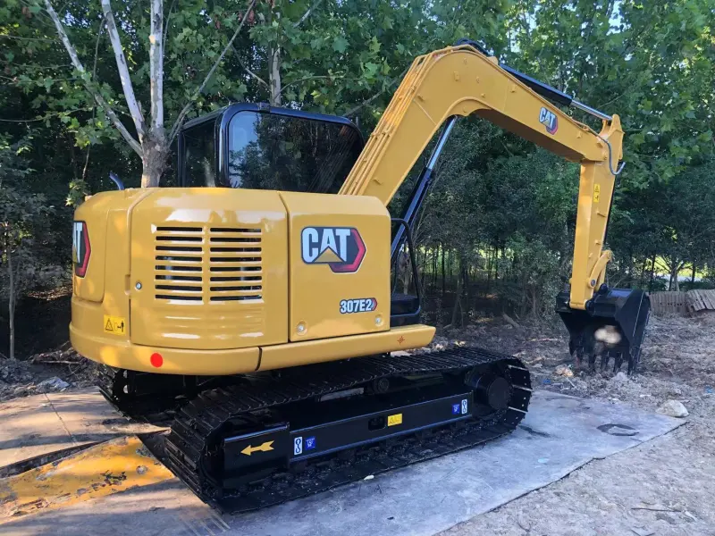 CAT 307D Excavator three-quarter angle with extended boom and arm