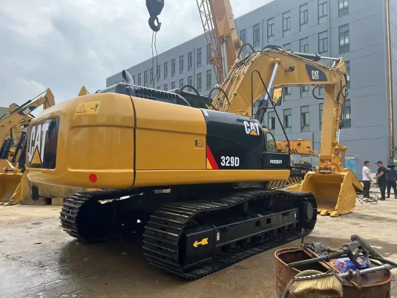 CAT 329D Excavator three-quarter front angle with extended boom and arm