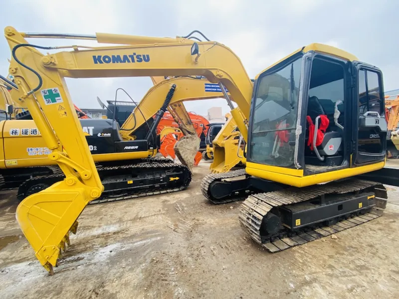 Komatsu PC60-7 excavator side profile with boom and arm fully extended