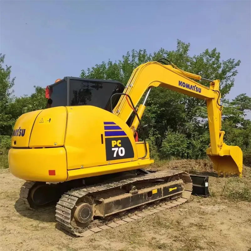 Used Komatsu PC70 Excavator side view with boom extended