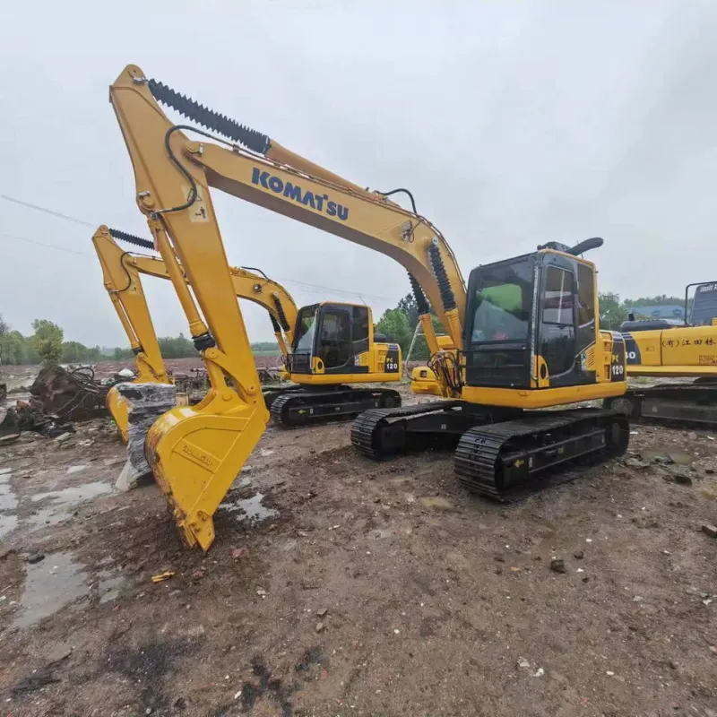 Komatsu PC120 excavator side view with fully extended arm