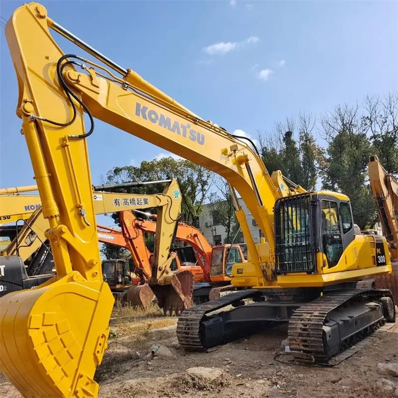 Komatsu PC300-7 excavator side view with boom fully extended