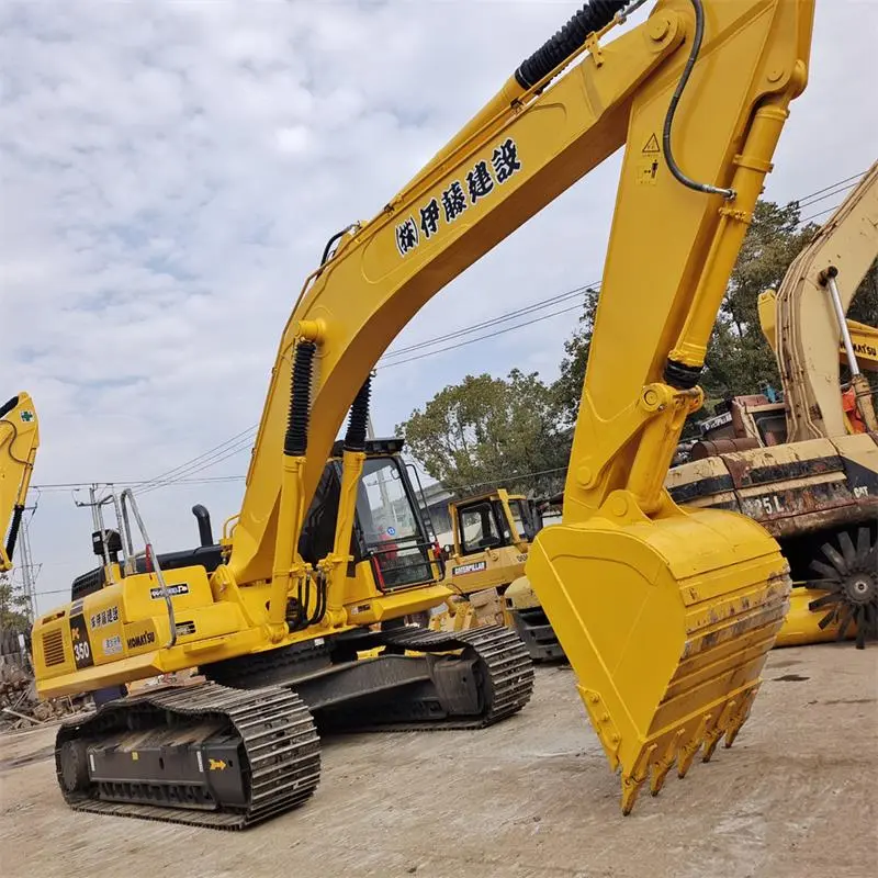 Komatsu PC350 excavator side view with boom fully extended