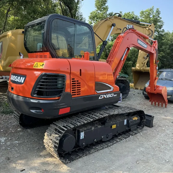 Three-quarter angle view of Doosan DX60 Excavator with boom extended, highlighting operator cab and digging arm