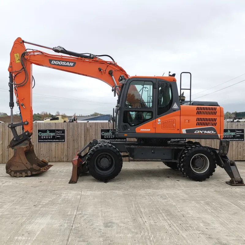 Doosan DX140W excavator side view with extended arm