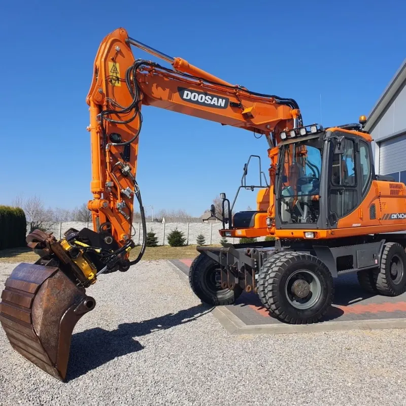 Doosan DX140W excavator three-quarter view with arm extended
