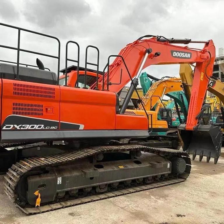 Used Doosan DX300 excavator side view with boom fully extended on construction site