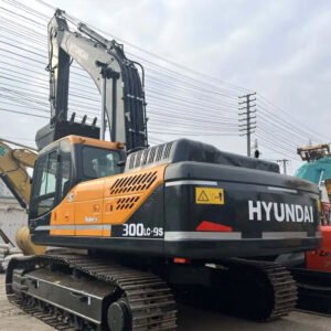 Used Hyundai 300 excavator with large bucket and reinforced undercarriage on construction site