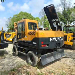 Used Hyundai 150W wheeled excavator front view with bucket attached