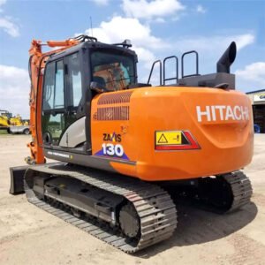 Used Hitachi EX130 ZX130 medium excavator with bucket lowered on construction site