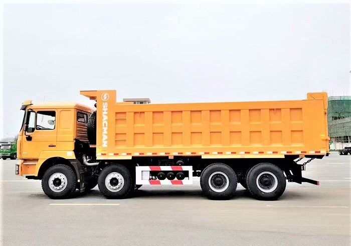Side view of Shacman F3000 8×4 400HP Dump Truck showing chassis, axles, and cargo body