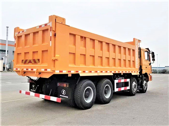 Rear 3/4 view of Shacman F3000 8×4 Dump Truck showing cargo body and hydraulic lifting system