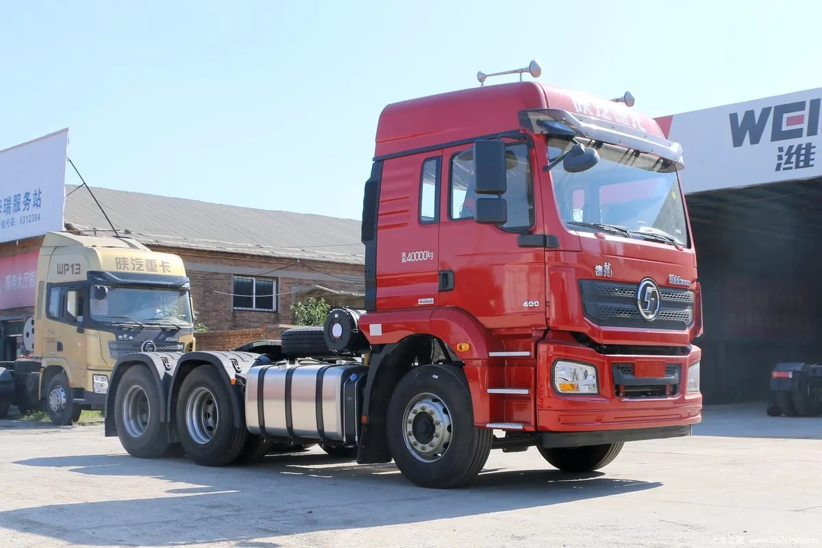Shacman M3000 6×4 400HP tractor truck three-quarter angle view with aerodynamic cabin.
