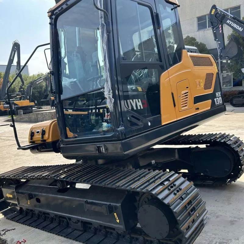 Used Hyundai 130 Excavator at 3/4 angle showing boom and bucket fully extended on worksite