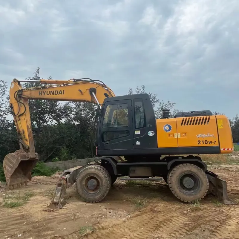 Side profile of Hyundai 210W excavator with boom and bucket fully extended