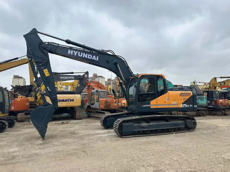 Side view of Hyundai 225 with boom and bucket fully extended