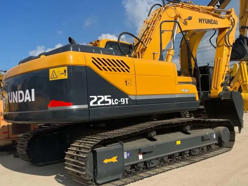 Three-quarter angle of Hyundai 225 hydraulic excavator in action