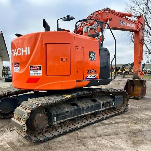 Used Hitachi EX225 ZX225 Excavator 3/4 angle view showing boom partially extended and overall machine structure