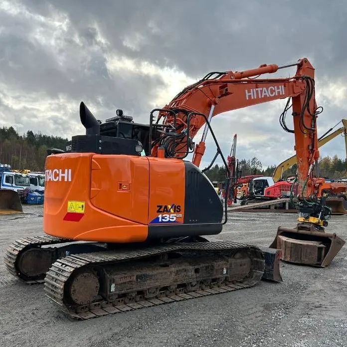 Used Hitachi EX135 ZX135 Excavator 3/4 angle view showing boom partially extended and versatile operation