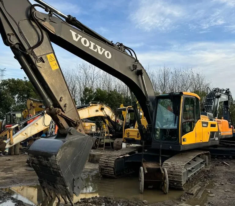 Close-up of boom and hydraulic arm of Used Volvo EC220 22-ton excavator