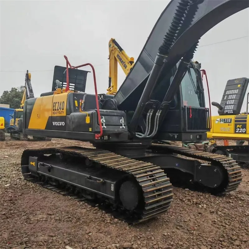 Volvo EC240 Excavator track close-up, highlighting undercarriage durability and heavy-duty rollers