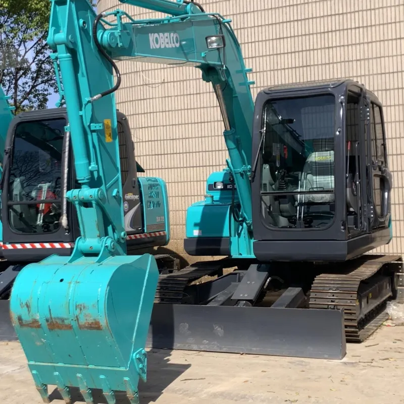Close-up of Kobelco SK75 Excavator boom showing strength and precision