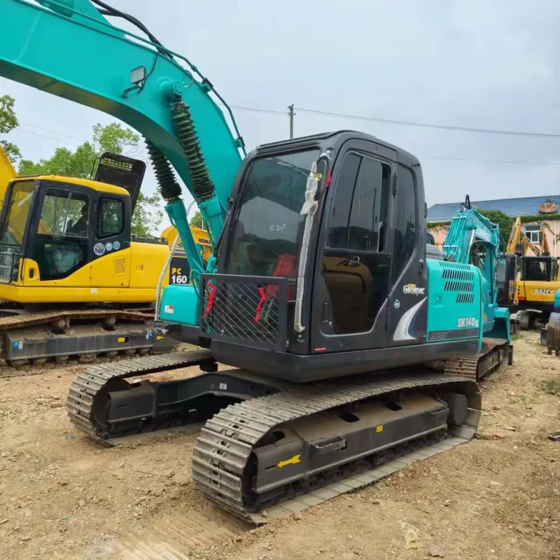 Close-up of Kobelco SK140 Excavator tracks showing stability and durability