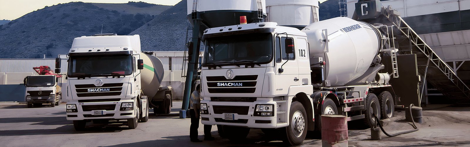 Shacman heavy-duty trucks including dump trucks, tractor trucks, and mixer trucks for Africa and Middle East