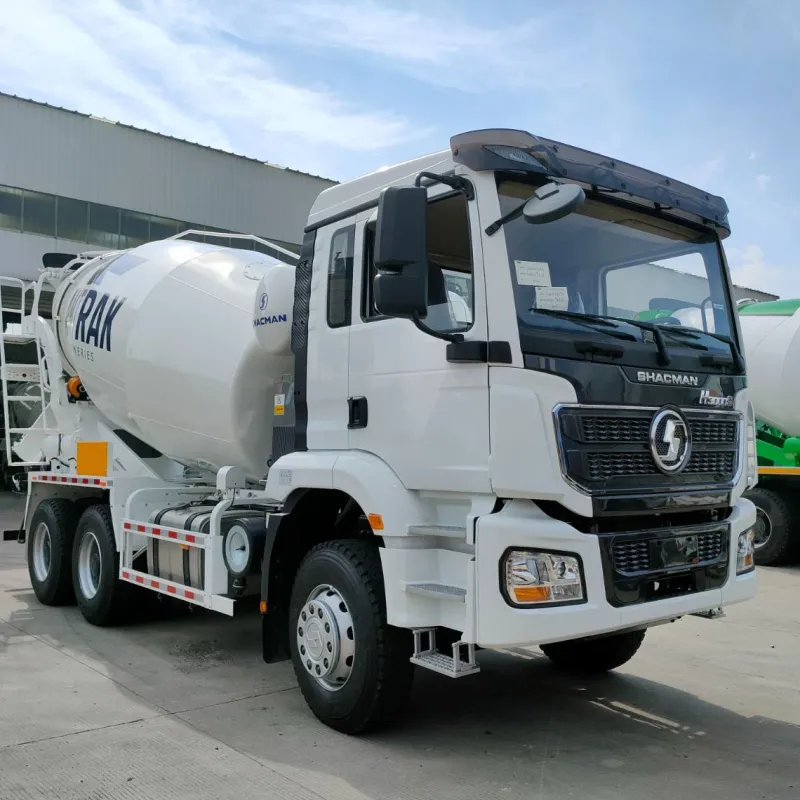 Three-quarter angle view of Shacman H3000 concrete mixer truck showcasing front cabin, mixing drum, and heavy-duty build