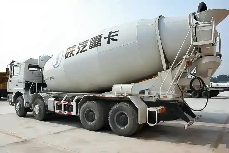 Close-up view of Shacman X3000 8x4 concrete mixer truck drum showing wear-resistant blades and rotating mechanism
