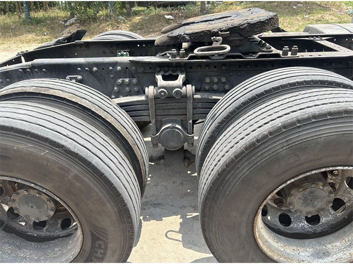 Close-up view of heavy-duty tires on FAW J6P 460HP 6x4 Tractor Truck showing tread pattern and durability for long-haul transport