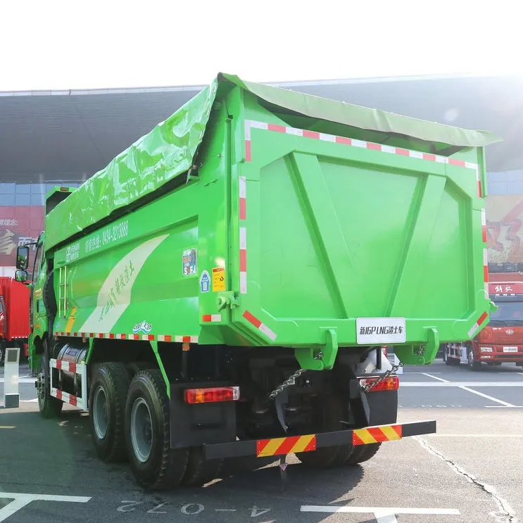 Side view of FAW J6P 6x4 440HP Dump Truck showing long wheelbase and reinforced dump body