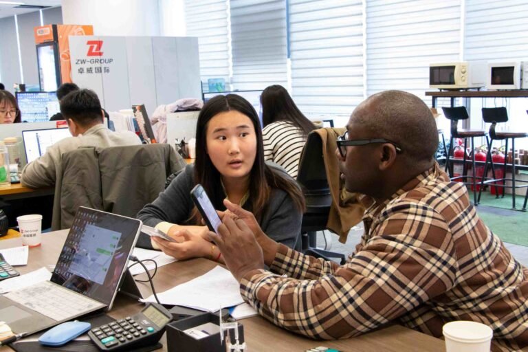 Senegal clients discussing equipment with ZW Group team during a factory visit