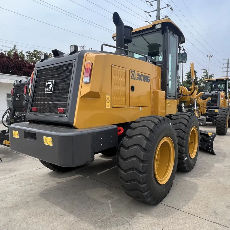 Front view of Brand New XCMG GR215 Motor Grader with powerful engine, articulated frame, and heavy-duty grading blade for road construction
