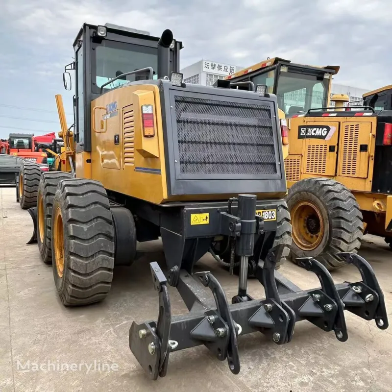 Front three-quarter view of XCMG GR1803 motor grader showing blade, cab, and front structure