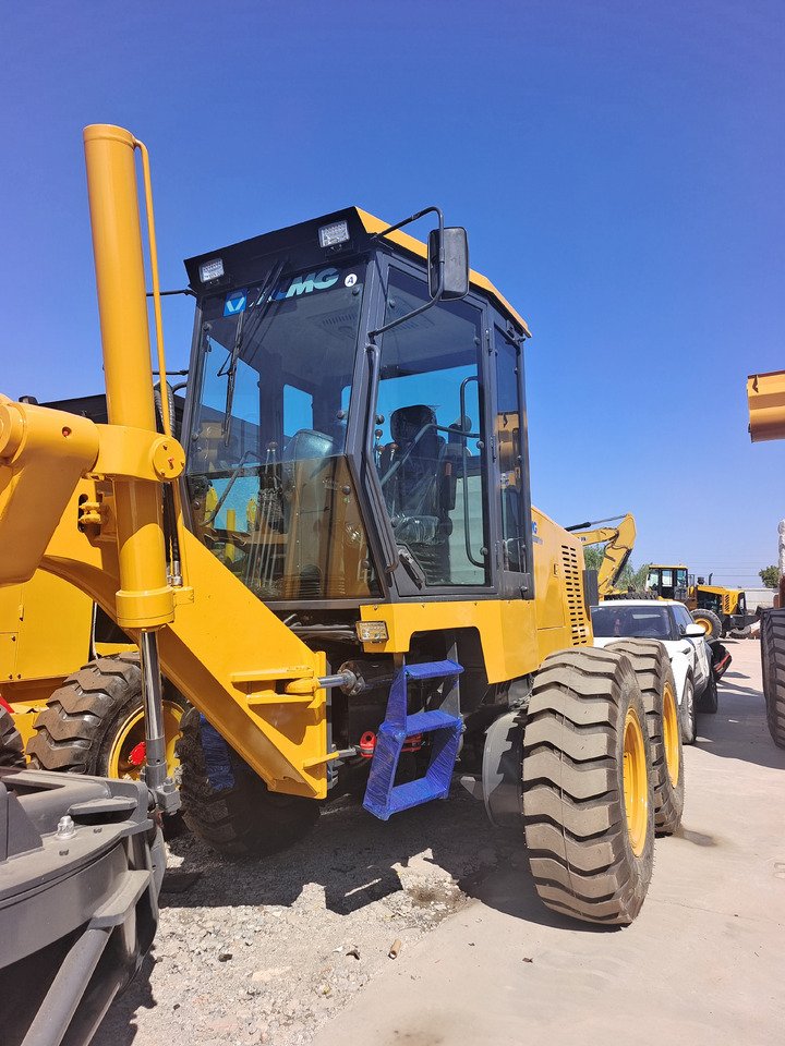 XCMG GR1803 motor grader cab exterior close-up showing cabin structure and design