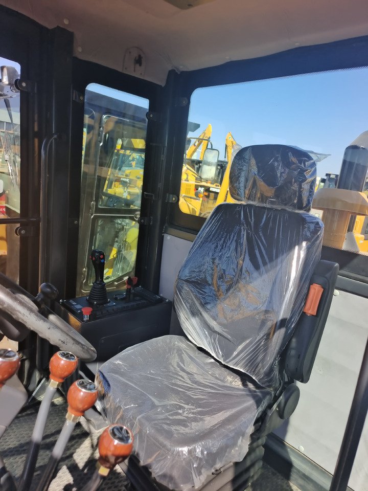 XCMG GR1803 motor grader cabin close-up showing operator seat and control system