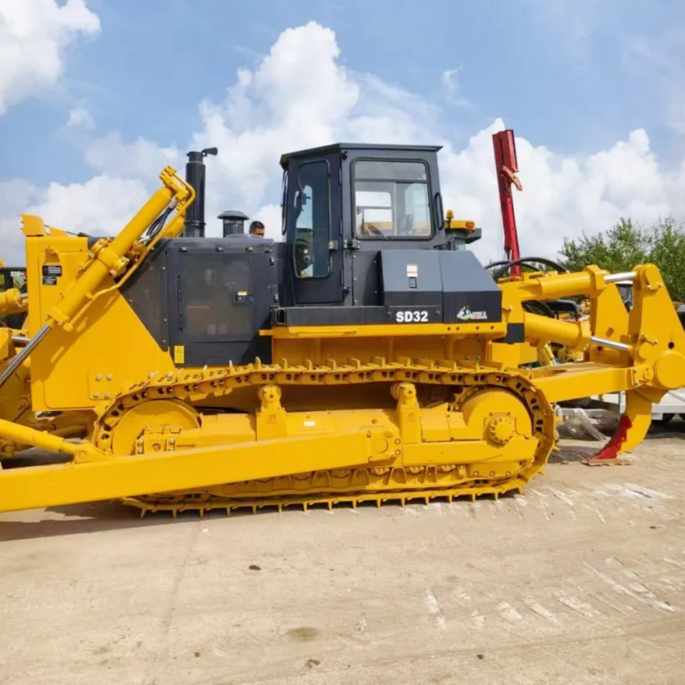 Side view of Shantui SD32 bulldozer showing crawler tracks, long undercarriage, and heavy-duty blade for mining operations