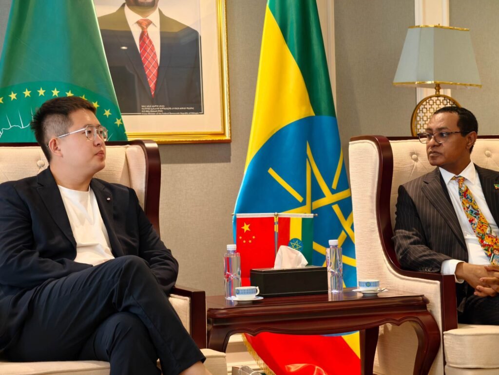 ZW Group President Ivan Sun in a deep strategic discussion with Ethiopian Ambassador H.E. Tefera Derbew Yimam about heavy-duty truck supply and infrastructure projects.