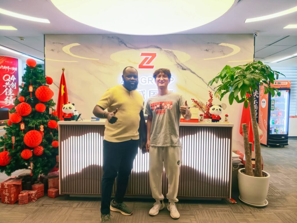 HOWO TX Dump Truck Rwanda client visit at ZW Group headquarters for fleet procurement.