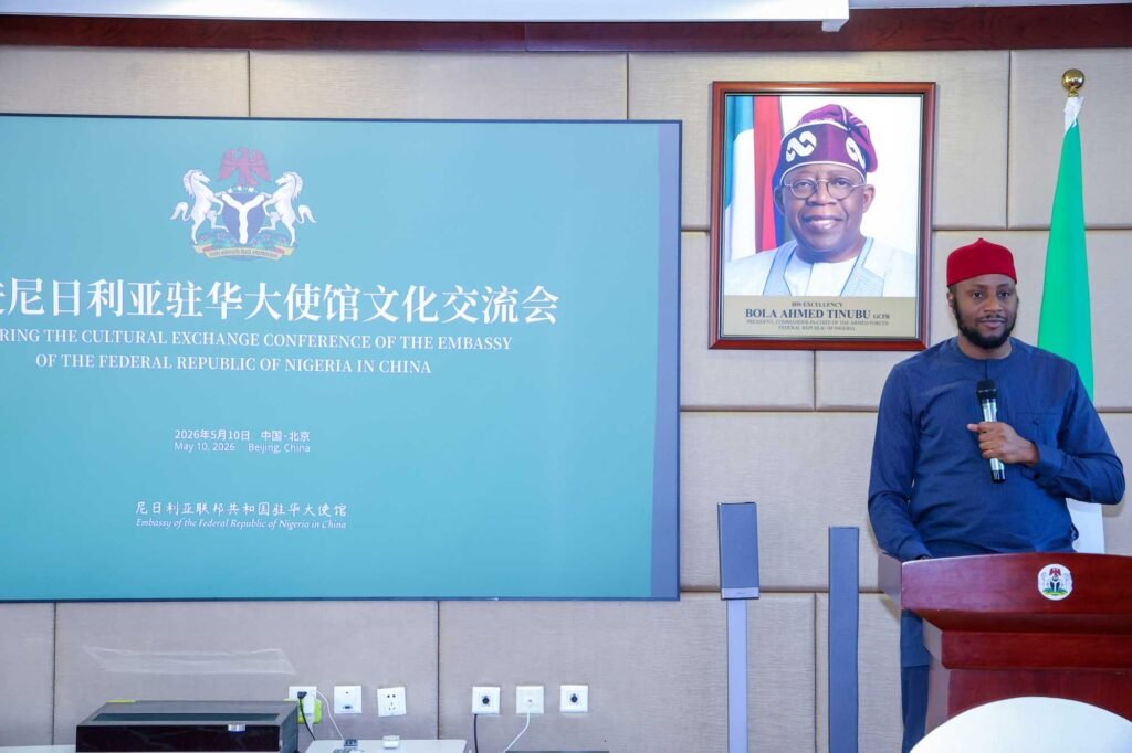 Official cultural exchange conference at the Nigerian Embassy in China, highlighting ZW Group's role in heavy machinery and truck supply.
