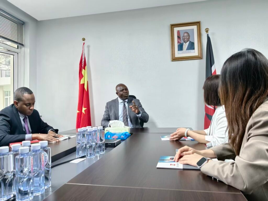 Kenya Ambassador Willy Bett and ZW Group senior management discussing heavy truck and construction machinery cooperation in Beijing